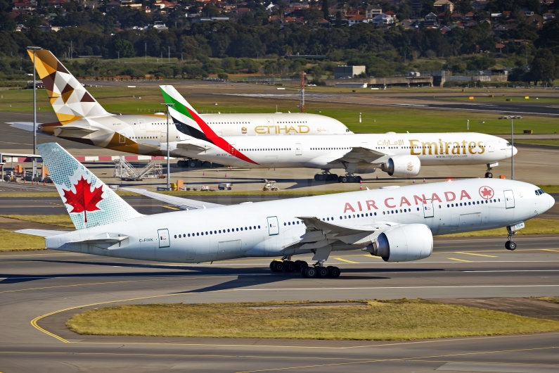 Air Canada Boeing 777-233(LR) C-FIVK, Emirates Boeing 777-31H(ER) A6-ECF, Etihad Airways Airbus A380-861 A6-APB