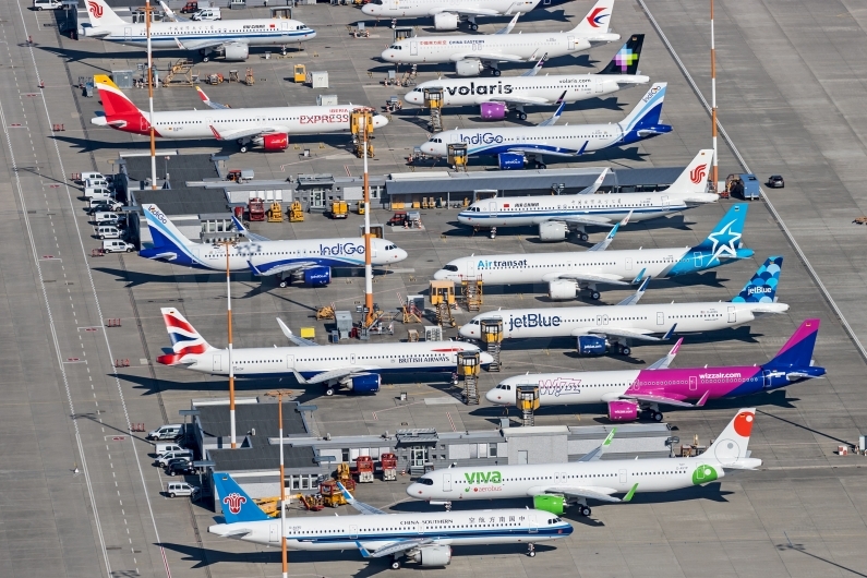 Aerial view: several A320neo and A321neo (first A321neo for Iberia Express EC-NGP and Viva Aerobus XA-VBA)